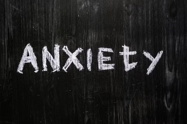 Blackboard with the word 'anxiety' written on it