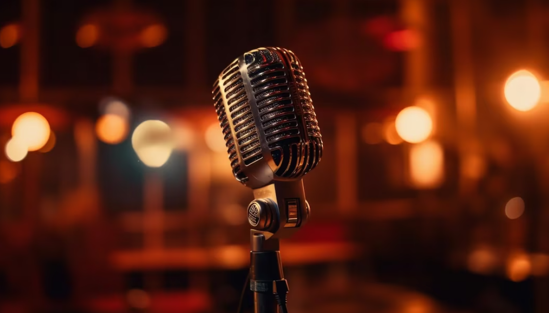 silver microphone in a room with red lighting